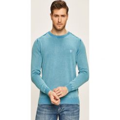 Guess Jeans - Sweter. Żółte swetry męskie Guess Jeans, s, z aplikacjami, z bawełny, z okrągłym kołnierzem, bez kaptura. W wyprzedaży za 229,90 zł.