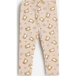 Bawełniane legginsy ze wzorem -. Legginsy damskie Reserved, bez wzorów, z bawełny. Za 25,99 zł.
