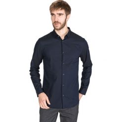 Armani Exchange Koszula Niebieski. Niebieskie koszule męskie Armani Exchange, l, bez wzorów, z bawełny, bez kołnierzyka, z długim rękawem. Za 418,95 zł.