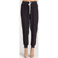 SPODNIE DRESOWE Twinset U&B. Czarne spodnie damskie xs, z dresówki. Za 300,00 zł.