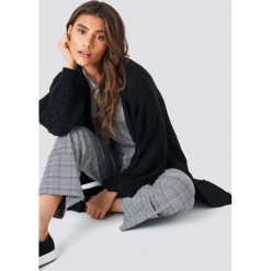 NA-KD Kardigan z dzianiny Links Links - Black. Czarne kardigany damskie marki NA-KD, z dzianiny. Za 161,95 zł.
