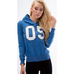 Indygo biała z cekinami 0115. Białe bluzy damskie marki Fasardi, xl, bez wzorów, bez rękawów, bez kaptura. Za 39,00 zł.