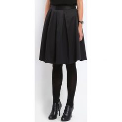 SPÓDNICA REGULARNA DAMSKA GŁADKA. Czarne spódniczki damskie Top Secret, na co dzień, bez wzorów, eleganckie, midi, rozkloszowane. W wyprzedaży za 44,99 zł.