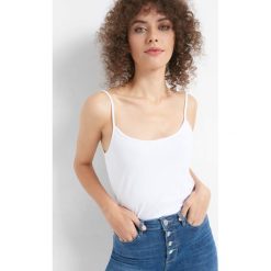 Dopasowany top. Białe topy damskie Orsay, xs, w jednolite wzory, z bawełny. Za 14,99 zł.