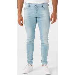 Diesel Troxer Dżinsy Niebieski. Niebieskie jeansy męskie Diesel, bez wzorów. Za 638,95 zł.