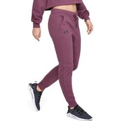 Under Armour Spodnie dresowe Fioletowy. Fioletowe spodnie damskie Under Armour, l, z bawełny. Za 206,95 zł.