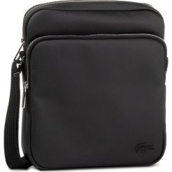 Saszetka LACOSTE - NH2343HC Black 000. Czarne torby męskie skórzane Lacoste, bez wzorów, ze skóry ekologicznej, młodzieżowe. W wyprzedaży za 379,00 zł.
