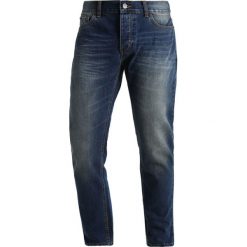 Dickies NORTH CAROLINA Jeansy Zwężane mid blue. Szare jeansy męskie marki Dickies, z bawełny. W wyprzedaży za 213,85 zł.