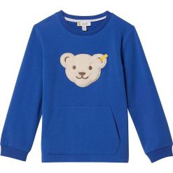 Bluza w kolorze niebieskim. Niebieskie bluzy niemowlęce Steiff, z aplikacjami, bez rękawów, bez kaptura. W wyprzedaży za 85,95 zł.