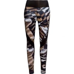 Legginsy DEHA ACTIVE Brązowy|Print. Pomarańczowe legginsy sportowe damskie marki Deha, z tkaniny. Za 216,00 zł.