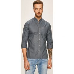 Tommy Jeans - Koszula. Białe koszule męskie Tommy Jeans, s, bez wzorów, z bawełny, casualowe, ze stójką, z długim rękawem. Za 359,90 zł.