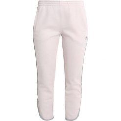 Converse CONVERSE X MILEY CYRUS TRACK PANT Spodnie treningowe pink. Czerwone spodnie dresowe damskie Converse, s, z poliesteru. Za 379,00 zł.
