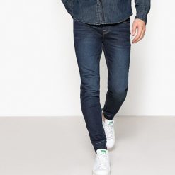 Dżinsy z dzianiny. Niebieskie jeansy męskie z dziurami marki La Redoute Collections. Za 146,96 zł.