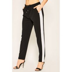 Spodnie materiałowe Liu Jo Sport TA0027 T8423. Czarne spodnie damskie Liu Jo Sport, l, z elastanu. W wyprzedaży za 409,00 zł.