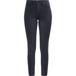Cheap Monday Spray Jeans Skinny Fit crow. Czarne jeansy damskie relaxed fit marki Cheap Monday. W wyprzedaży za 174,30 zł.