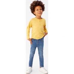 Mango Kids - Jeansy dziecięce Diego 80-104 cm. Niebieskie spodnie chłopięce Mango Kids, bez wzorów, z elastanu. Za 59,90 zł.