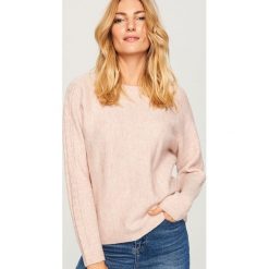 Sweter z błyszczącym włóknem - Różowy. Niebieskie swetry klasyczne damskie marki KIPSTA, z materiału, młodzieżowe. Za 79,99 zł.