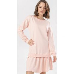 Jasnoróżowa Sukienka Theleli. Różowe sukienki damskie Born2be, xl, bez wzorów, z dzianiny, bez kołnierzyka, bez rękawów. Za 79,99 zł.