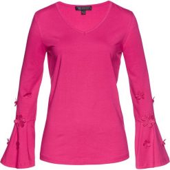 Shirt z dzianiny z aplikacjami, długi rękaw bonprix różowy. Różowe koszulki damskie bonprix, z aplikacjami, z elastanu, z dekoltem w serek, z długim rękawem. Za 64,99 zł.