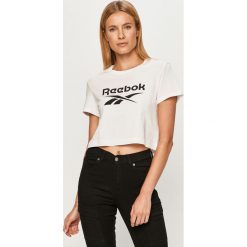 Reebok Classic - T-shirt. Białe topy damskie Reebok Classic, s, z nadrukiem, z elastanu, casualowe, z okrągłym kołnierzem. Za 79,90 zł.