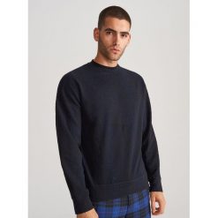 Bluza ze strukturalnej dzianiny - Czarny. Czarne bluzy męskie Reserved, s, bez wzorów, z dzianiny, bez kołnierzyka, bez rękawów, bez kaptura. Za 119,99 zł.