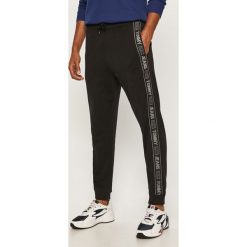 Tommy Jeans - Spodnie. Czarne spodnie męskie Tommy Jeans, s, z aplikacjami, z bawełny. Za 399,90 zł.