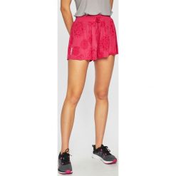 Desigual Sport - Szorty. Pomarańczowe spodenki sportowe damskie marki Desigual Sport, s, bez wzorów, z poliesteru, sportowe, z podwyższonym stanem. Za 179,90 zł.