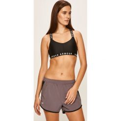 Under Armour - Biustonosz sportowy. Czarne biustonosze sportowe damskie Under Armour, s, bez wzorów, z elastanu. Za 139,90 zł.