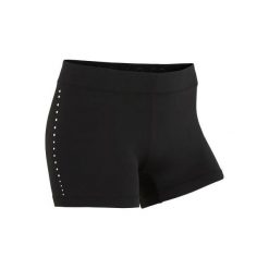 Spodenki czarne z kryształkami dla gimnastyczek sportowych 900. Czarne spodenki sportowe damskie DOMYOS, l, bez wzorów, z elastanu, eleganckie, na jogę i pilates. Za 59,99 zł.
