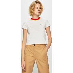 Tommy Jeans - Top. Białe bluzki damskie marki Tommy Jeans, s, bez wzorów, z bawełny, casualowe, z okrągłym kołnierzem, z krótkim rękawem. Za 179,90 zł.
