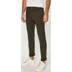 Tommy Hilfiger - Spodnie. Zielone spodnie męskie TOMMY HILFIGER, na co dzień, bez wzorów, z elastanu. W wyprzedaży za 299,90 zł.