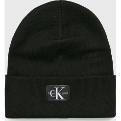 Calvin Klein Jeans - Czapka. Różowe czapki damskie marki Calvin Klein Jeans, na zimę, bez wzorów, z bawełny. Za 179,90 zł.