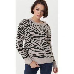 Beżowy Sweter Travancore. Brązowe swetry damskie Born2be, s, bez wzorów, prążkowane, bez rękawów, długie, bez kaptura. Za 89,99 zł.