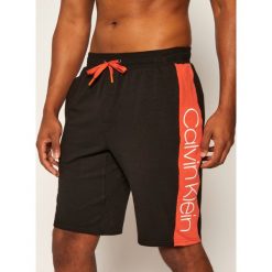 Szorty materiałowe Calvin Klein Underwear 000NM1800E. Czarne spodenki i szorty męskie Calvin Klein Underwear, m, bez wzorów, z tkaniny. W wyprzedaży za 179,00 zł.