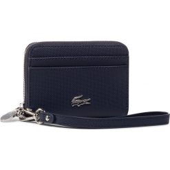 Mały Portfel Damski LACOSTE - Xs Wristlet Zip Wallet NF2778DC Peacoat 021. Niebieskie portfele damskie Lacoste, bez wzorów, ze skóry ekologicznej. Za 319,00 zł.