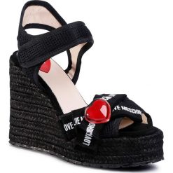 Espadryle LOVE MOSCHINO - JA1609BI0AJS0000 Nero. Czarne espadryle damskie Love Moschino, z aplikacjami, ze skóry, bez obcasa, na obcasie. Za 1239,00 zł.