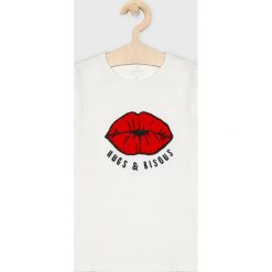 Name it - T-shirt dziecięcy 122-164. Białe bluzki dziewczęce Name it, z aplikacjami, z elastanu, z okrągłym kołnierzem, bez rękawów, bez kaptura. Za 59,90 zł.