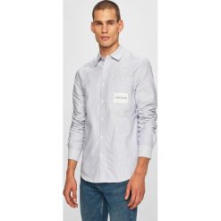 Calvin Klein Jeans - Koszula. Niebieskie koszule męskie Calvin Klein Jeans, xl, bez wzorów, z bawełny, klasyczne, z klasycznym kołnierzykiem, z długim rękawem. W wyprzedaży za 249,90 zł.