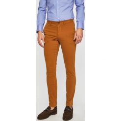 Tommy Hilfiger - Spodnie. Spodnie męskie TOMMY HILFIGER, na co dzień, bez wzorów, z elastanu, casualowe. W wyprzedaży za 339,90 zł.