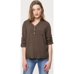 Zielona Koszula Fiber. Zielone bluzki damskie Born2be, xl, bez wzorów, bez kołnierzyka, bez rękawów. Za 49,99 zł.