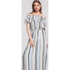 Niebieska Sukienka Lambada. Niebieskie sukienki damskie other, s, bez wzorów, bez kołnierzyka, bez rękawów, maxi. Za 79,99 zł.