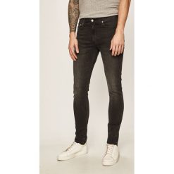 Calvin Klein Jeans - Jeansy J30J314344. Czarne jeansy męskie Calvin Klein Jeans, z aplikacjami. Za 449,90 zł.