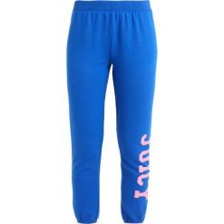 Spodnie dresowe damskie: Juicy Couture TERRY LOGO VARSITY PANT Spodnie treningowe sea breeze
