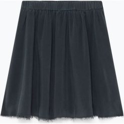 Jedwabna spódnica "Overland" w kolorze antracytowym. Szare spódniczki damskie American Vintage, s, bez wzorów, z jedwabiu, mini, rozkloszowane. W wyprzedaży za 300,95 zł.