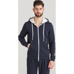 BLUZA Armani Exchange. Niebieskie bluzy męskie Armani Exchange, s, bez wzorów, z materiału, z kapturem, bez rękawów, z kapturem. Za 426,30 zł.
