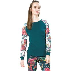 Koszulka w kolorze turkusowym ze wzorem. Niebieskie bluzki sportowe damskie marki Desigual Sport, s, z długim rękawem. W wyprzedaży za 130,95 zł.