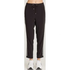 SPODNIE LIU JO SPORT. Czarne spodnie damskie Liu Jo Sport, s, z dresówki, sportowe. Za 679,00 zł.