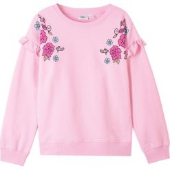 Bluza z falbanami bonprix jasnoróżowy kryształowy. Różowe bluzy dziewczęce bonprix, z nadrukiem, bez rękawów, bez kaptura. Za 54,99 zł.