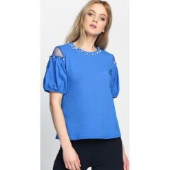 Niebieska Bluzka Got The Blues. Niebieskie bluzki damskie Born2be, s, z aplikacjami, z okrągłym kołnierzem. Za 69,99 zł.