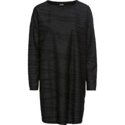 Sukienka z dżerseju, oversize bonprix czarny. Czarne sukienki damskie bonprix, bez wzorów, z dżerseju, bez kołnierzyka, z długim rękawem, długie, oversize. Za 29,99 zł.